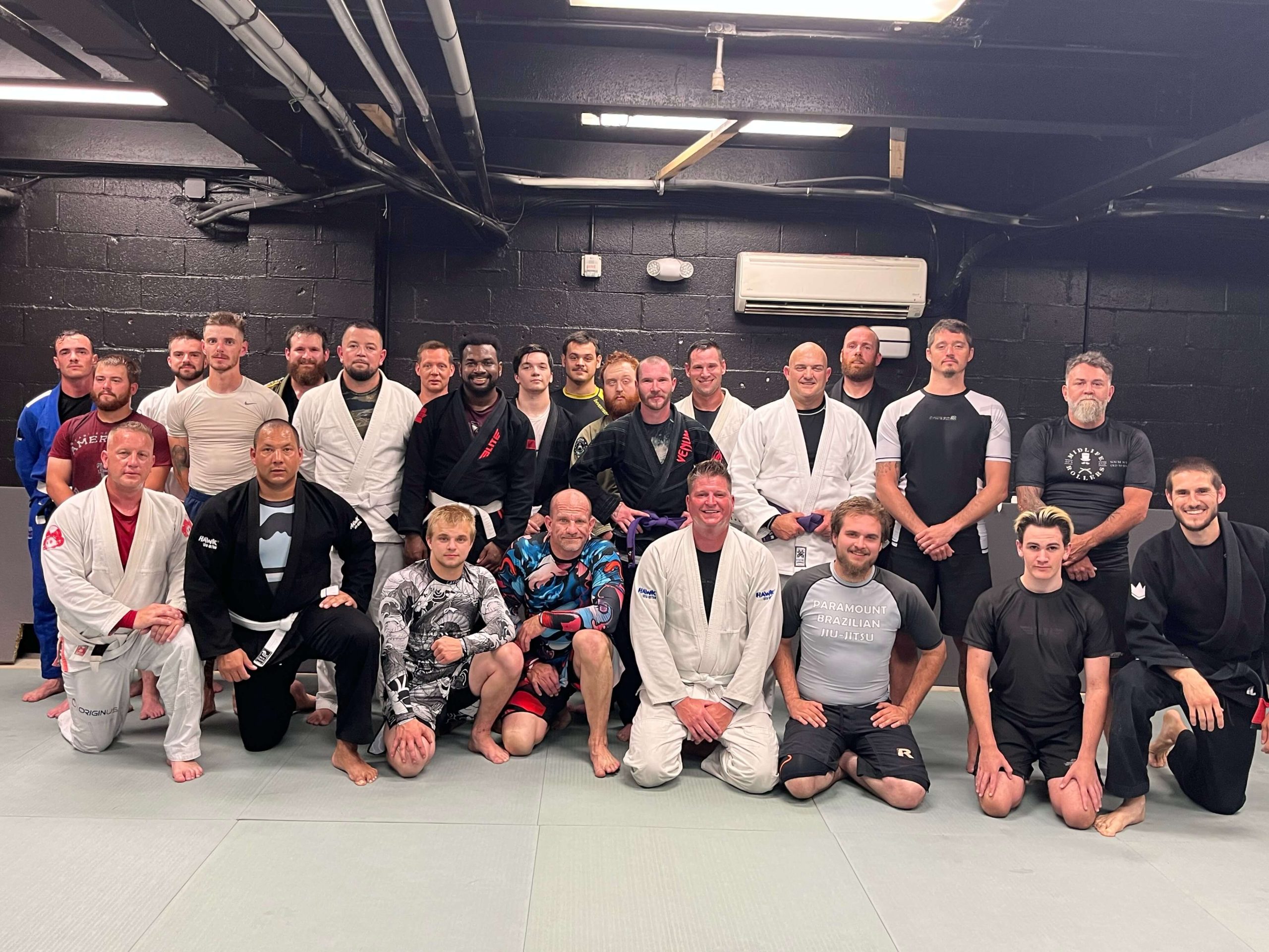 Achieve Jiu Jitsu Academy students and instructors on the mats